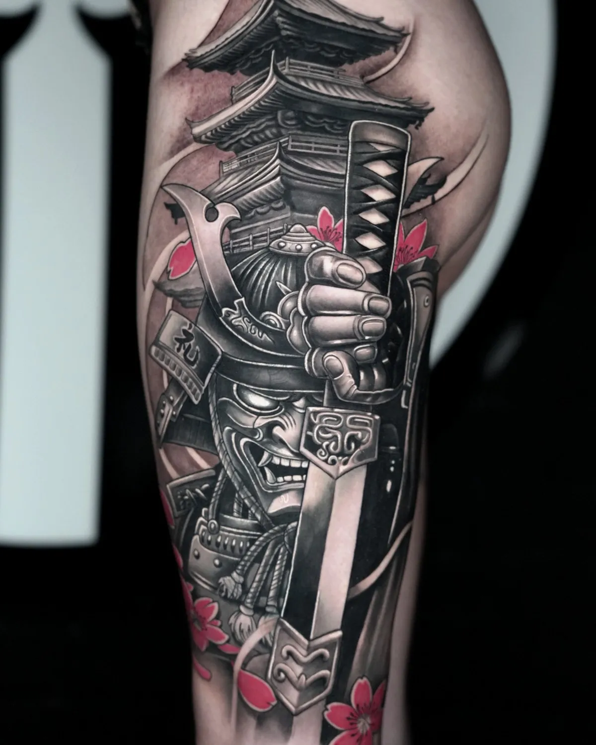 Samurai with a hannya mask, pagoda and cherry blossoms on the thigh, healed
